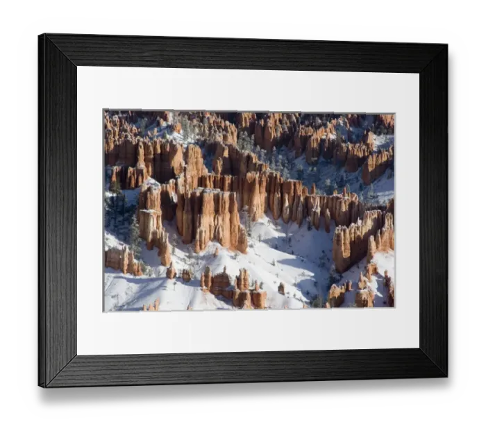 Framed Print : USA - Utah. Pillars of limestone at Bryce Canyon National Park after snowstorm at sunrise