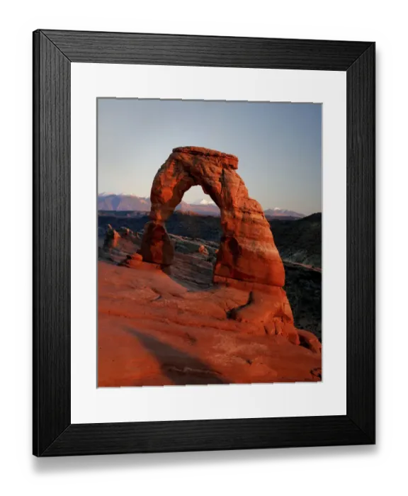 Framed Print : Delicate Arch at Sunset with snow covered La Sal mountains in the background Framed Print : Delicate Arch at Sunset with snow covered La Sal mountains in the background
