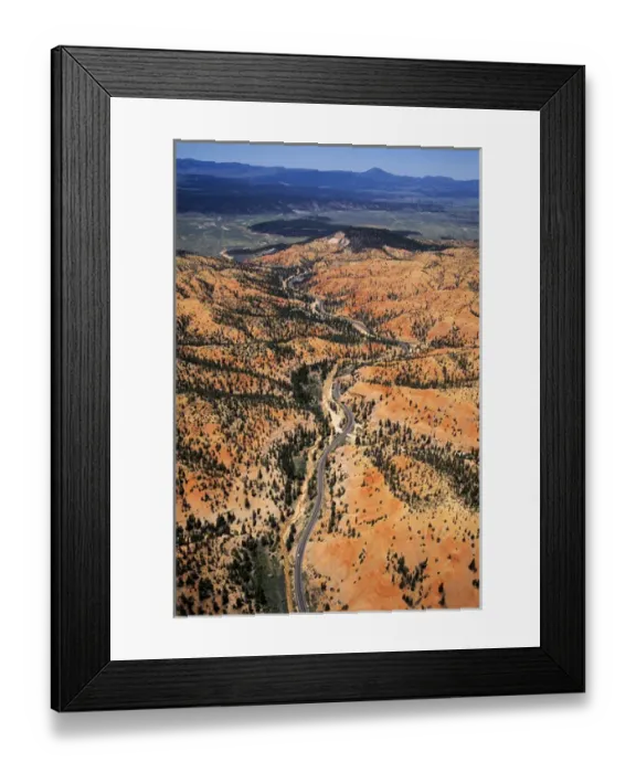 Framed Print : Aerial view of Utah Highway 12 snaking through Red Canyon between town of Panguitch Framed Print : Aerial view of Utah Highway 12 snaking through Red Canyon between town of Panguitch