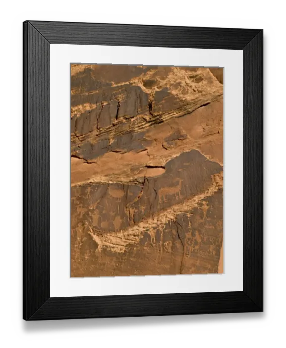 Framed Print : Petroglyphs -- Native American rock art on cliffs along Colorado River near Moab, UT Framed Print : Petroglyphs -- Native American rock art on cliffs along Colorado River near Moab, UT