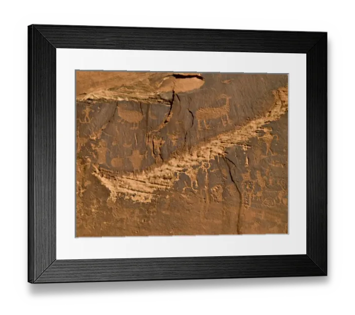 Framed Print : Petroglyphs -- Native American rock art on cliffs along Colorado River near Moab, UT Framed Print : Petroglyphs -- Native American rock art on cliffs along Colorado River near Moab, UT