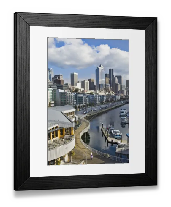 Framed Print : Puffy clouds over Seattle, Washington skyline seen from Elliot Bay with boats in the foreground, U