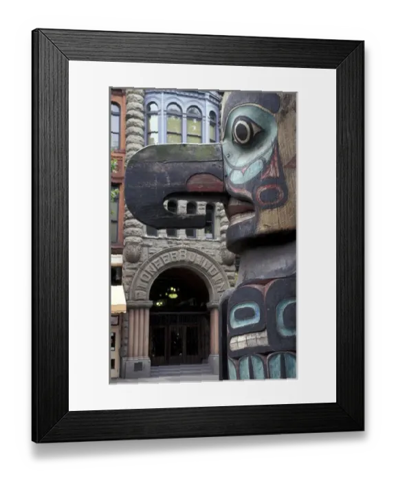 Framed Print : USA, Washington State, Seattle. Totem pole with Pioneer building in Pioneer Square Framed Print : USA, Washington State, Seattle. Totem pole with Pioneer building in Pioneer Square