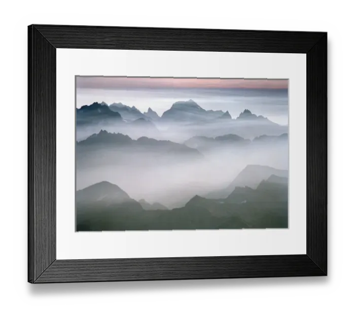 Framed Print : The rugged peaks of North Cascades National Park seen through mist with a band of Framed Print : The rugged peaks of North Cascades National Park seen through mist with a band of