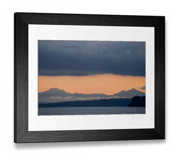 Framed Print : USA, WA, Puget Sound. Cascade Mountains predawn with dense deck of storm clouds above