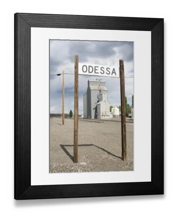 Framed Print : USA, Washington State, Lincoln County, Odessa. Grain elevators and silos by the railroad