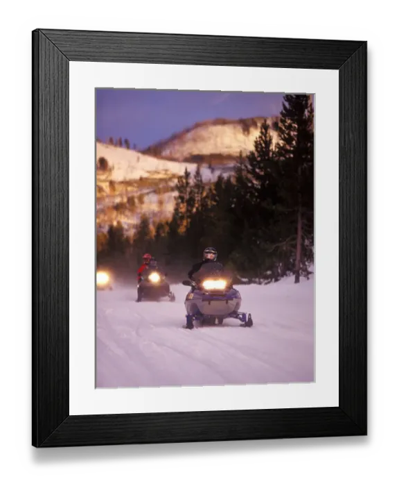 Framed Print : Snowmobilers at the end of the day in Yellowstone National Park