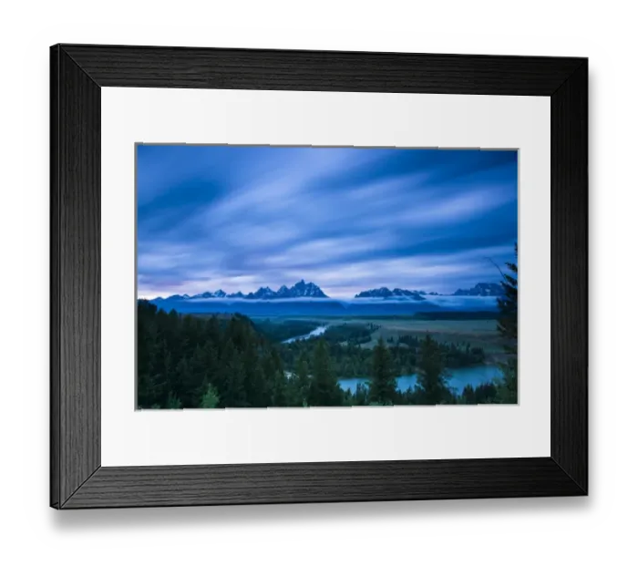 Framed Print : Clouds illuminate with red light above the Grand Teton mountains seen from the Snake