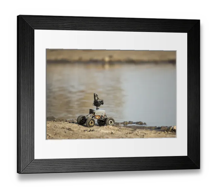 Framed Print : Africa, Botswana, Chobe National Park, Remote camera rover positioned by water hole Framed Print : Africa, Botswana, Chobe National Park, Remote camera rover positioned by water hole