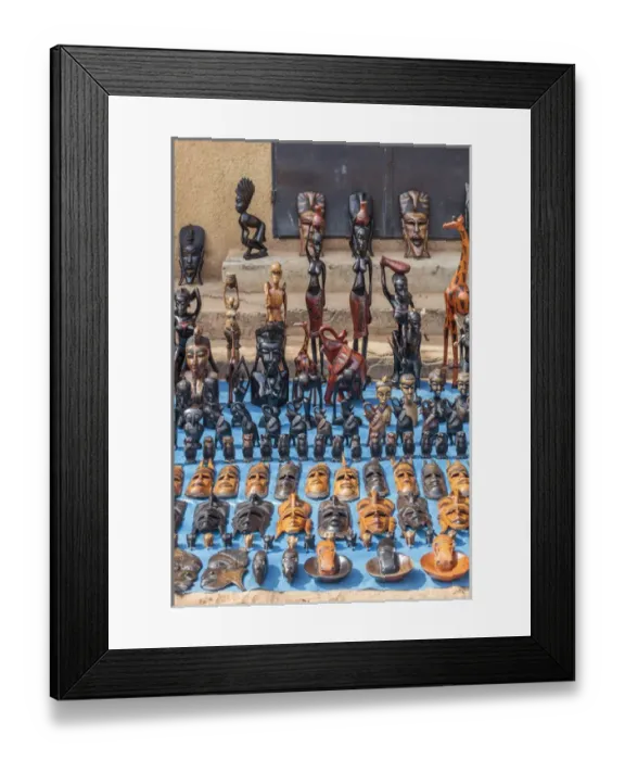 Framed Print : West Africa, The Gambia, Banjul. Wooden masks, animals, and other crafts for sale Framed Print : West Africa, The Gambia, Banjul. Wooden masks, animals, and other crafts for sale