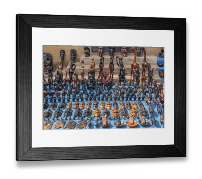 Framed Print : West Africa, The Gambia, Banjul. Wooden masks, animals, and other crafts for sale Framed Print : West Africa, The Gambia, Banjul. Wooden masks, animals, and other crafts for sale