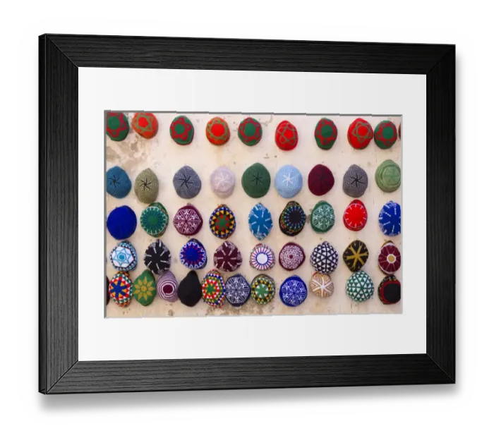 Framed Print : Morocco, Essaouira. Colorful mens hats (tagiya) hanging on wall Framed Print : Morocco, Essaouira. Colorful mens hats (tagiya) hanging on wall