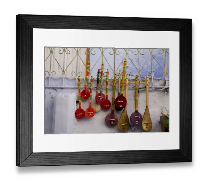 Framed Print : Musical instrument, souvenir shops in the Kasbah, Chefchaouen (Chaouen), Tangeri-Tetouan Region Framed Print : Musical instrument, souvenir shops in the Kasbah, Chefchaouen (Chaouen), Tangeri-Tetouan Region