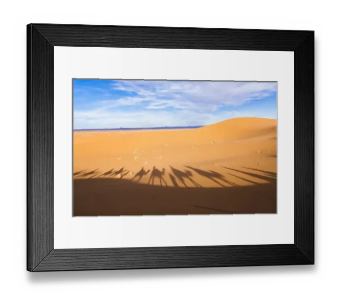 Framed Print : Morocco Sahara Desert sand dunes in Las Palmeras area with shadows of tourists riding Framed Print : Morocco Sahara Desert sand dunes in Las Palmeras area with shadows of tourists riding