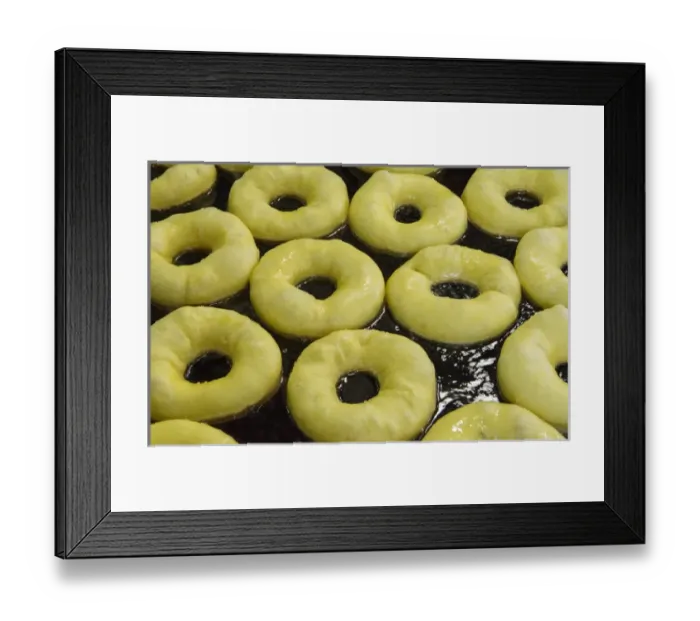 Framed Print : Rabat Morocco main medina close up of donuts in oil Framed Print : Rabat Morocco main medina close up of donuts in oil