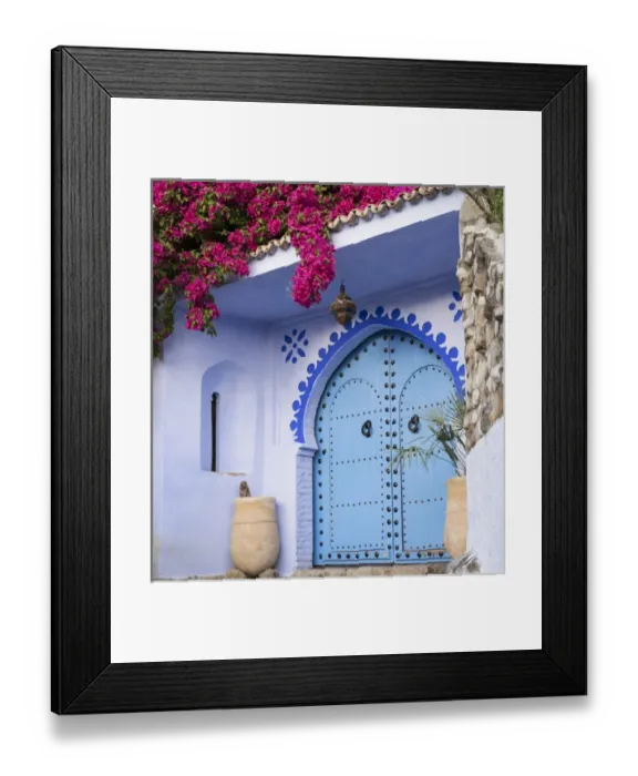 Framed Print : Morocco, Chefchaouen. Bougainvillea blossoms frame an ornate blue door Framed Print : Morocco, Chefchaouen. Bougainvillea blossoms frame an ornate blue door