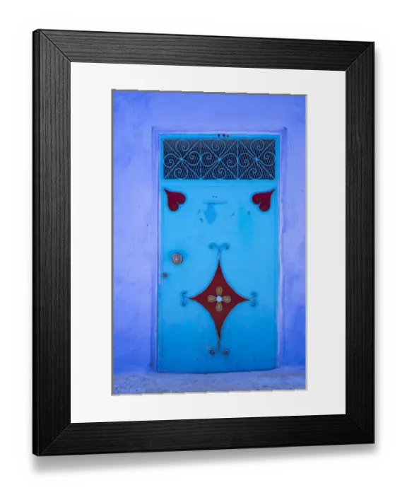 Framed Print : Morocco, Chefchaouen. A traditional metal painted door with red heart-like motifs Framed Print : Morocco, Chefchaouen. A traditional metal painted door with red heart-like motifs