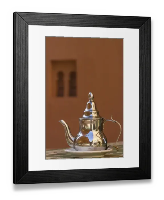 Framed Print : Africa, Morocco, Dades Gorge. Tea service reflects the colors of the steep walls
