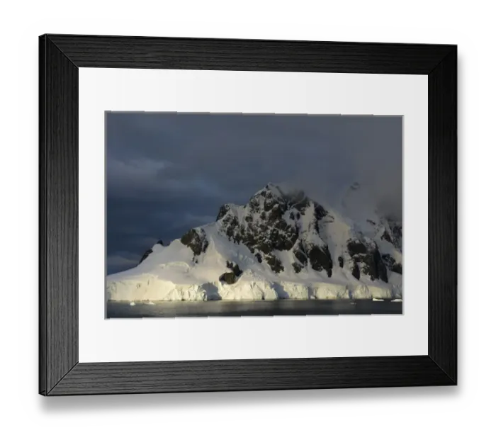 Framed Print : Antarctica. Antarctic Peninsula. Gerlache Strait. Orne Harbor. Mount Fourcade. Sunset