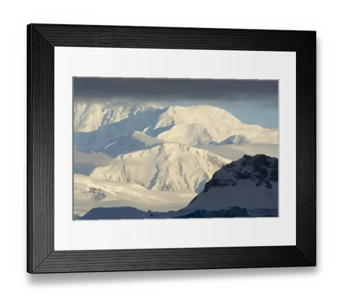 Framed Print : Antarctica. Antarctic Peninsula. Paradise Harbor. Bright sunlight on the mountains beyond