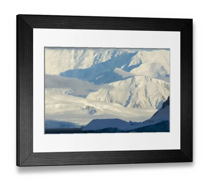 Framed Print : Antarctica. Antarctic Peninsula. Paradise Harbor. Bright sunlight on the mountains beyond Framed Print : Antarctica. Antarctic Peninsula. Paradise Harbor. Bright sunlight on the mountains beyond