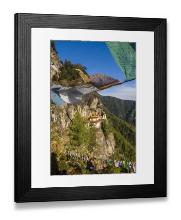 Framed Print : Praying flags before the Tiger-Nest, Taktshang Goempa monastery hanging in the cliffs