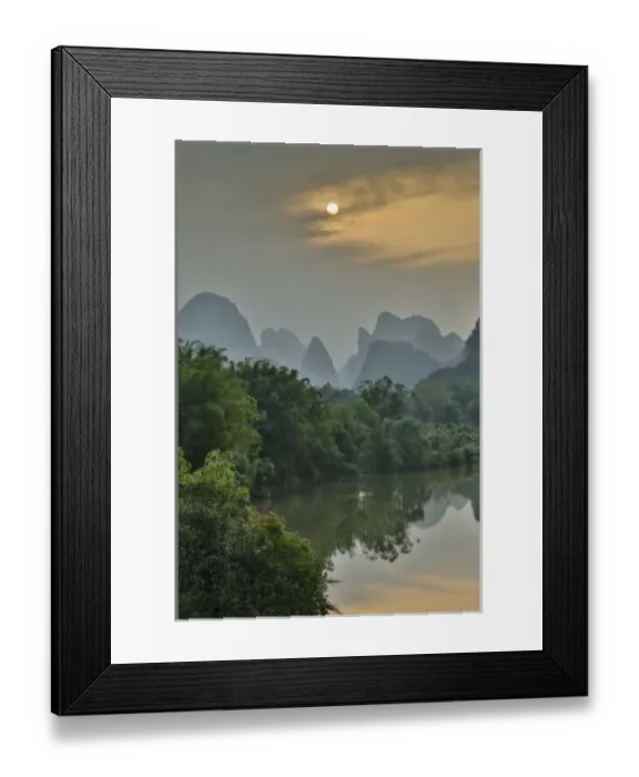 Framed Print : Sunset along the Li River near Yangshuo, China with the layering classic Mountains Framed Print : Sunset along the Li River near Yangshuo, China with the layering classic Mountains