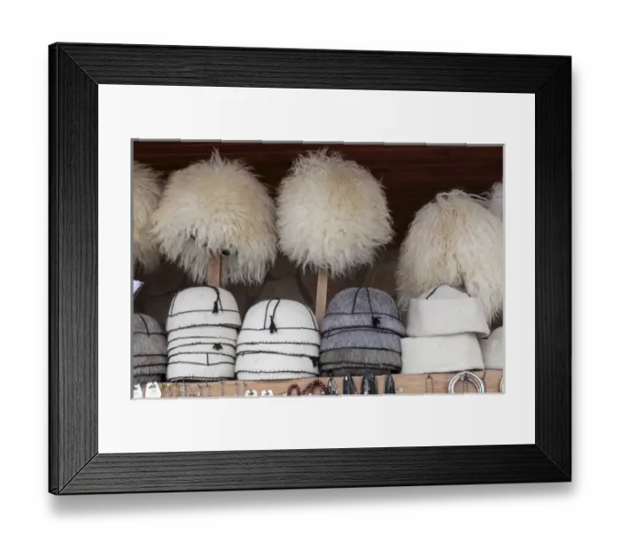 Framed Print : Georgia, Mtskheta. A collection of traditional hats for sale as souveniers