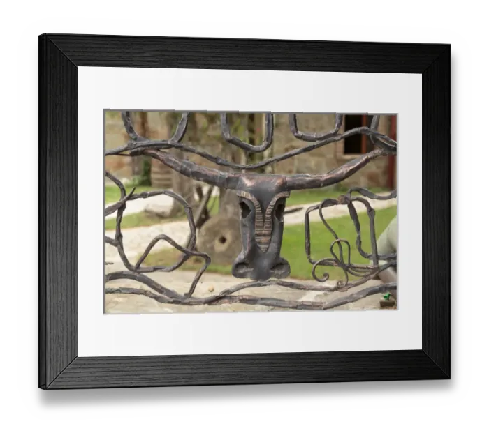 Framed Print : Georgia, Mtskheta. An decorative bull head on a metal fence