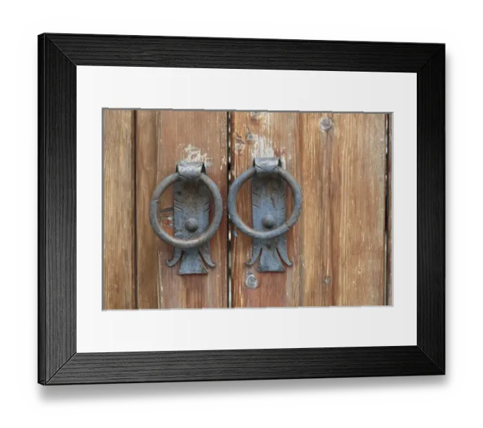 Framed Print : Georgia, Mtskheta. A close view of worn handles on a wooden gate