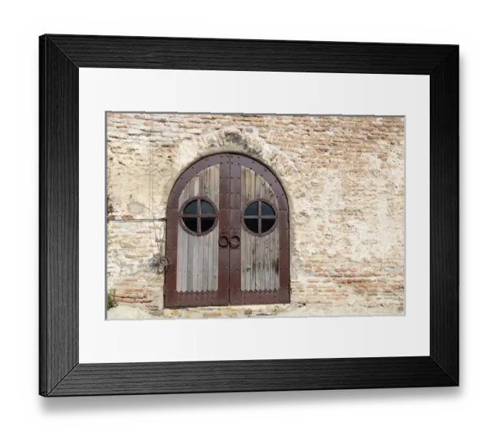 Framed Print : Georgia, Uplistsikhe. A rusted metal and wood door at the Uplistsikhe Cave Complex church
