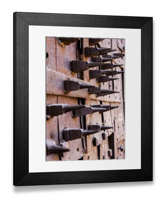 Framed Print : Door with spikes for defense against elephant attacks. 10th century. Jodhpur. Rajasthan Framed Print : Door with spikes for defense against elephant attacks. 10th century. Jodhpur. Rajasthan