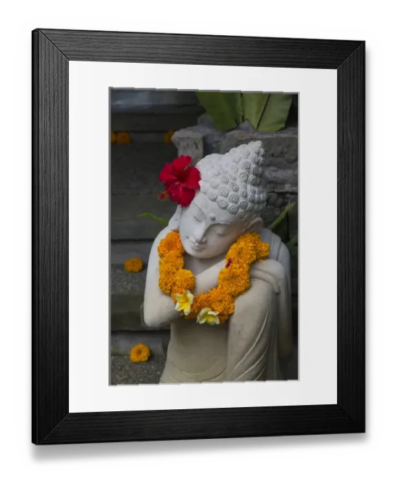 Framed Print : Asia, Indonesia, Bali. Sacred statue with red Hybiscus flower and yellow Marigold necklace