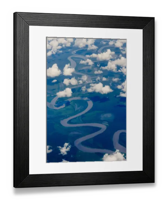 Framed Print : Aerial view of river winding through the island, Indonesia Framed Print : Aerial view of river winding through the island, Indonesia