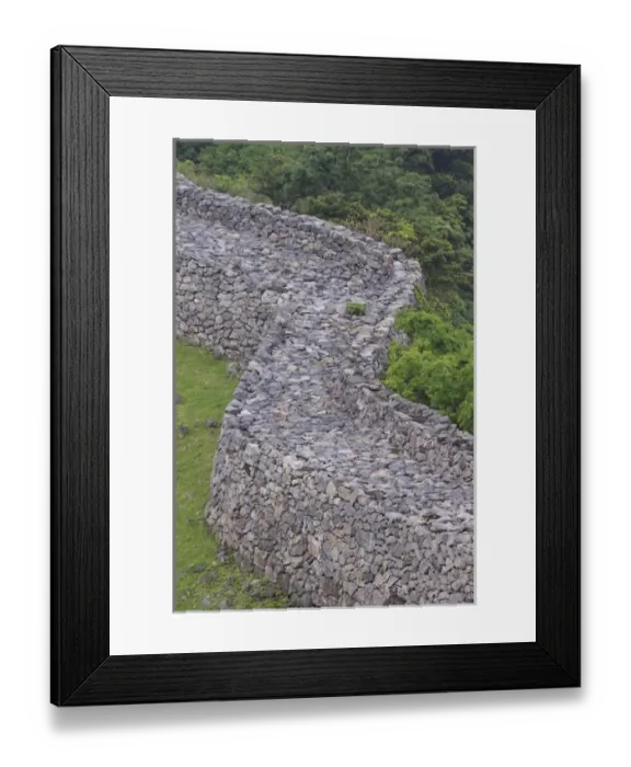 Framed Print : The tall stone walls are all that remain of Nakijin Castle, a 14th Century castle in Okinawa Framed Print : The tall stone walls are all that remain of Nakijin Castle, a 14th Century castle in Okinawa