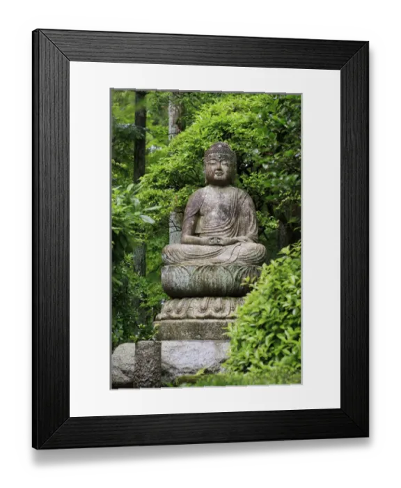 Framed Print : A stone Buddha statue in the grounds of Ryoan-Ji Temple in Kyoto, Japan