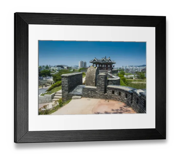 Framed Print : Huge stone walls around the Unesco world heritage sight the fortress of Suwon, South Framed Print : Huge stone walls around the Unesco world heritage sight the fortress of Suwon, South