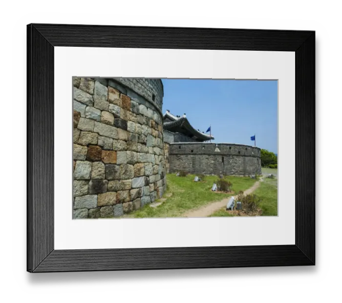 Framed Print : Huge stone walls around the Unesco world heritage sight the fortress of Suwon, South Framed Print : Huge stone walls around the Unesco world heritage sight the fortress of Suwon, South