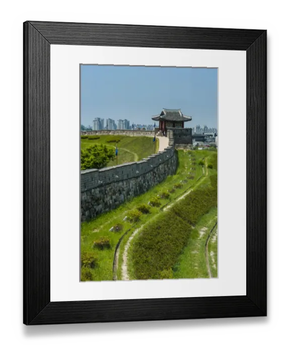 Framed Print : Huge stone walls around the Unesco world heritage sight the fortress of Suwon, South Framed Print : Huge stone walls around the Unesco world heritage sight the fortress of Suwon, South