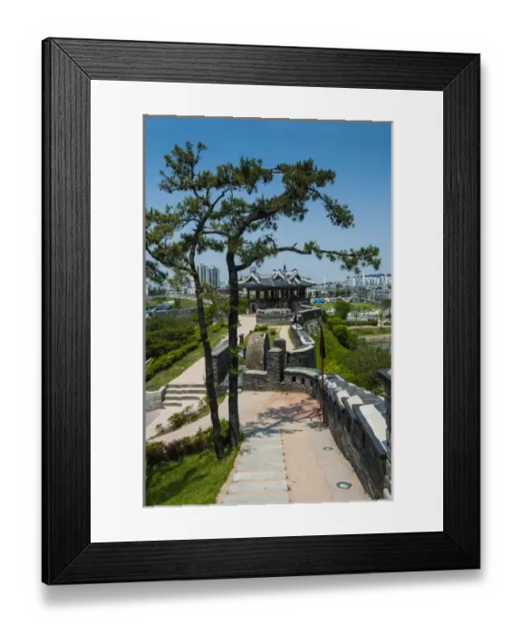 Framed Print : Huge stone walls around the Unesco world heritage sight the fortress of Suwon, South Framed Print : Huge stone walls around the Unesco world heritage sight the fortress of Suwon, South