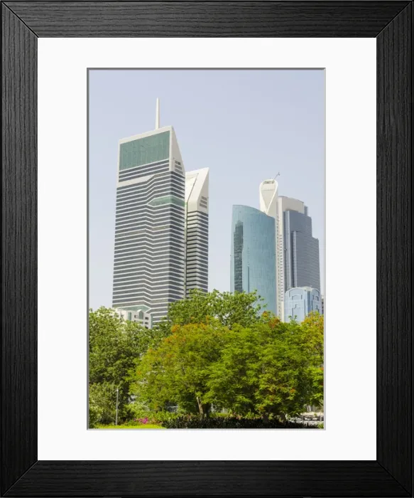 Framed Print : Small park and downtown skyline of Dubai, United Arab Emirates (UAE) Framed Print : Small park and downtown skyline of Dubai, United Arab Emirates (UAE)