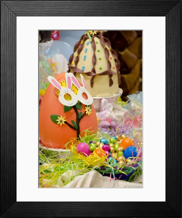 Framed Print : Australia. Easter display of large decorated chocolate eggs and holiday candy Framed Print : Australia. Easter display of large decorated chocolate eggs and holiday candy