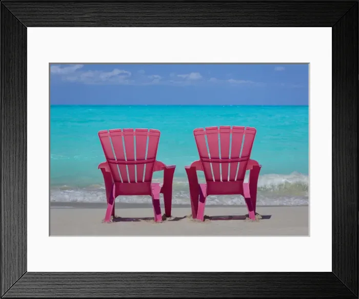 Framed Print : Bahamas, Little Exuma Island. Pink chairs on beach