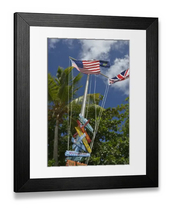 Framed Print : British Virgin Islands, Marina Cay. Colorful flags and direction signs Framed Print : British Virgin Islands, Marina Cay. Colorful flags and direction signs