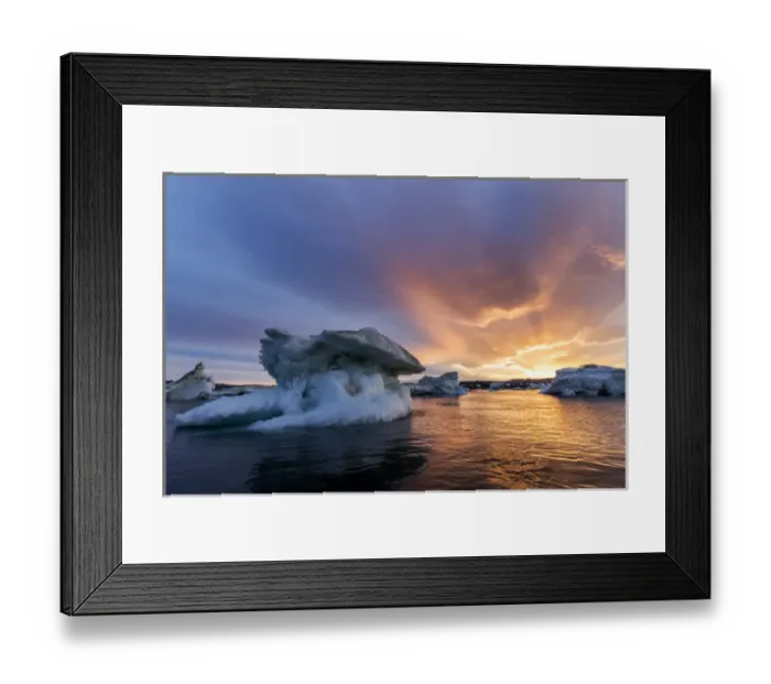 Framed Print : Canada, Nunavut, Territory, Setting midnight sun lights clouds above melting iceberg Framed Print : Canada, Nunavut, Territory, Setting midnight sun lights clouds above melting iceberg