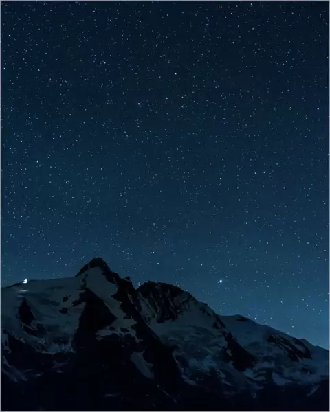 Night sky with millions of stars over Mt. Grossglockner (3798m) in the National Park Hohe Tauern