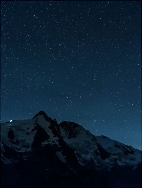 Night sky with millions of stars over Mt. Grossglockner (3798m) in the National Park Hohe Tauern