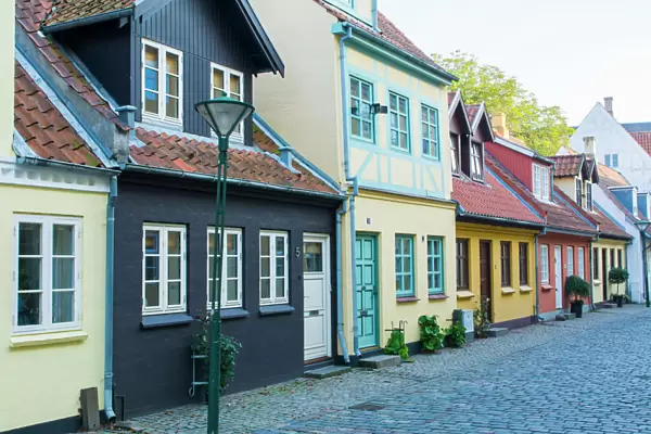 Odense Denmark, beautiful old row homes cobblestone streets in Hans Christian Andersen