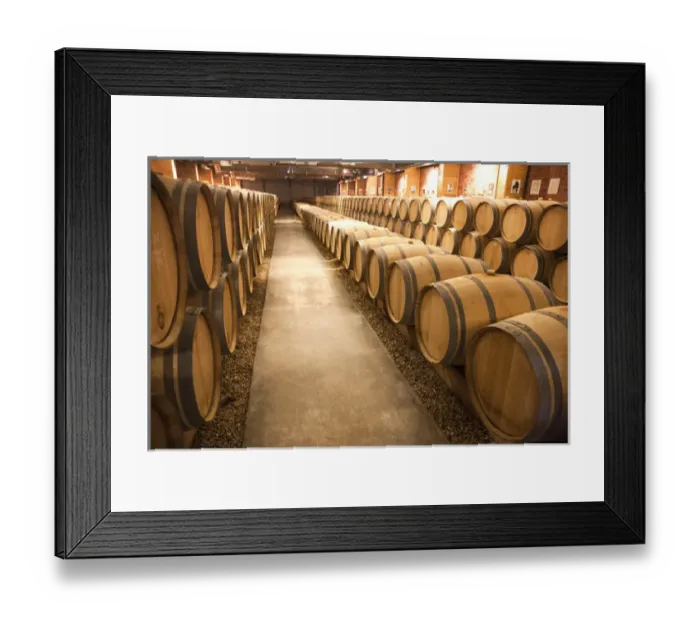 Framed Print : This is a storage area for wine harvested in the Haut-Medoc region of southwest France Framed Print : This is a storage area for wine harvested in the Haut-Medoc region of southwest France