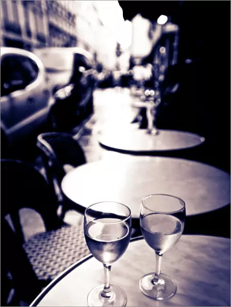 Wine glasses at an outdoor cafe, Paris, France